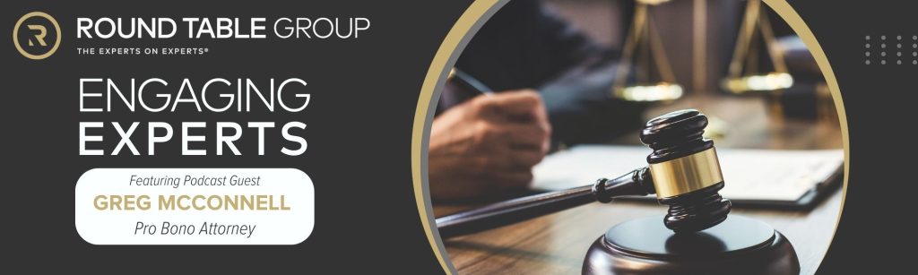 Gavel and legal business man reviewing contract.